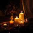 Candles with Christmas decorations in dark interior