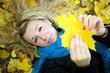 young woman in autumn yellow forest