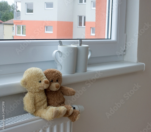 Photo: Teddy bears on radiator Teddy bears on radiator