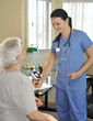 young nurse with senior patient young nurse with senior patient