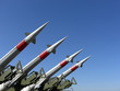 Four missiles against clear blue sky Four missiles against clear blue sky