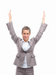 Young beautiful woman standing with hands raised Young beautiful woman standing with hands raised