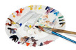 paintbrush, tubes of paint and porcelain plait as a palette