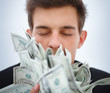 Extreme closeup of a young business man holding money Extreme closeup of a young business man holding money