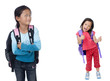 two young asian school girls ready for class.