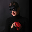 eautiful woman wearing mask, dramatic light