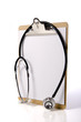 A doctor clipboard with a stethoscope and a blank sheet paper