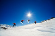 Sequence shot of snowboarder going over jump