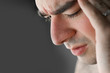 A young man that has an intense headache. A young man that has an intense headache.