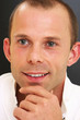 Young man, close-up isolated in black Young man, close-up isolated in black