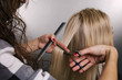 hairdresser at work over grey background