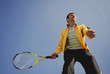 player in tennis on blue background sky iin sunny day