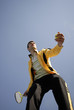 player in tennis on blue background sky iin sunny day
