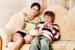 Girls and the boy on sofa