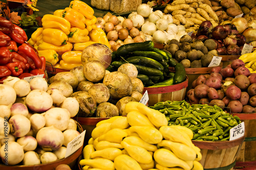 Photo: Baskets of Vegetables being displayed at a farmer's market. Baskets of Vegetables being displayed at a farmer's market.