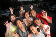 Happy diverse group of friends together outdoors at twilight Happy diverse group of friends together outdoors at twilight