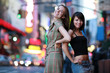 Two beautiful girl posing in New York City. Shallow DOF.