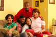 Happy family of five together at home