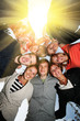 Group of happy young people in circle outdoors