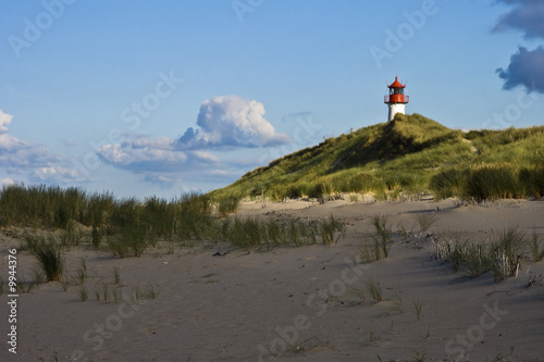 Foto: Leuchturm hinter Düne Leuchturm hinter Düne
