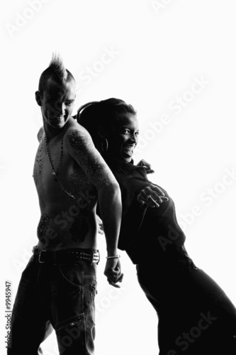 Photo: Man with Mohawk and Woman wearing Dreadlocks Man with Mohawk and Woman wearing Dreadlocks