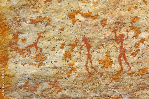 man and woman hunting bushman's wall artwork in africa