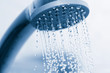 water flowing from metal shower
