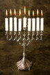 Nine candles in a silver jewish hanukkah candle holder