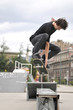 Boy practicing skate in a skate park