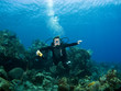 Diver smiling underwater on a Caribbean Reef