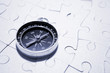 Compass on puzzle