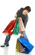 Happy shopping man. Isolated over white background..