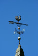A Old historic roof with weather vane A Old historic roof with weather vane