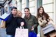 two couples going shopping at the city center