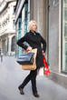 beautiful woman doing shopping at city center