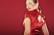 On red background girl with red lipstick - sexy portrait