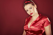 On red background girl with red lipstick - sexy portrait