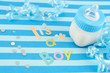 a blue baby bottle with milk and celebratory it's a boy text