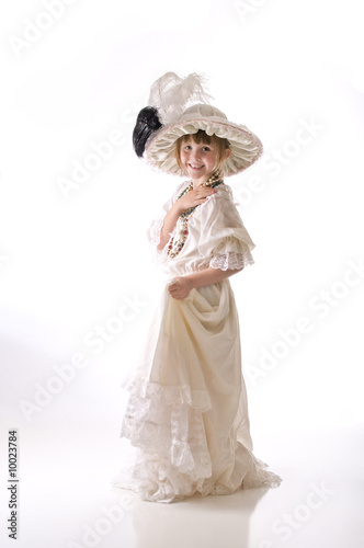 Photo: Dressing up in grandma's hat and dress Dressing up in grandma's hat and dress