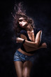 sexy woman dancing, dark background