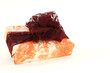 Christmas present in orange original paper with bordo tie
