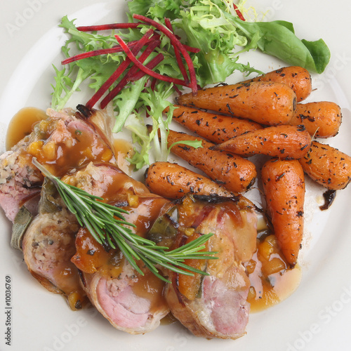Photo: Pork fillet with apricot stuffing and roasted baby carrots Pork fillet with apricot stuffing and roasted baby carrots