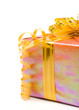 Shiny gift box with ribbon on a white background