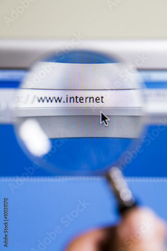 Photo: Magnifying glass on web browser Magnifying glass on web browser