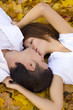 kissing couple in autumn park