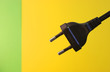 an  electricity fuse adapter in a simple yellow background