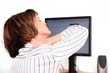 Business woman holding her neck with hand.
