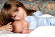 Photo: A big sister giving her baby brother some love A big sister giving her baby brother some love