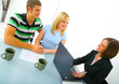 two caucasian couple talking with real estate broker