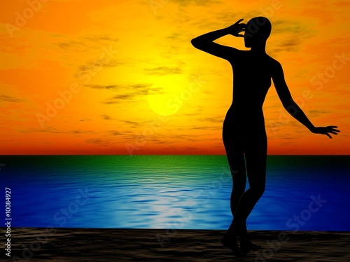 Silhuette of a woman on sandy beach, looking at the sunset Silhuette of a woman on sandy beach, looking at the sunset
